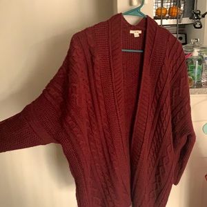 1 maroon sweater and 1 jean jacket.